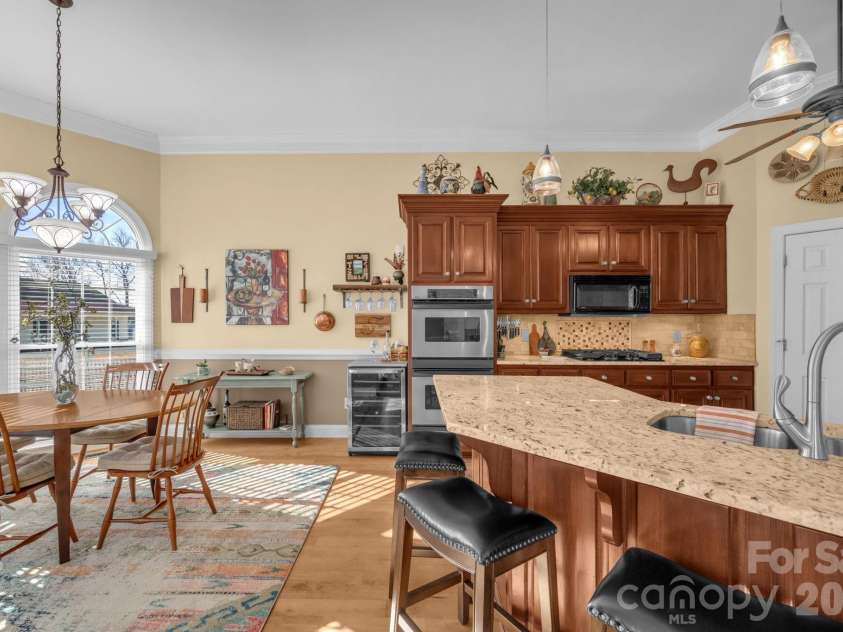5432 Highway 218 Highway, Monroe, NC 28110.  MLS# CAR4340240, YatesRealty ID 3316. Granite countertops, decorative tile backsplash and Maple Cabinets