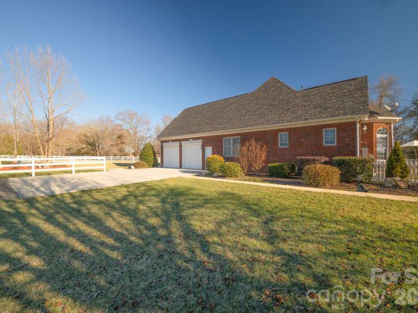 5432 Highway 218 Highway, Monroe, NC 28110.  MLS# CAR4340240, YatesRealty ID 3316. Oversized two car side load garage