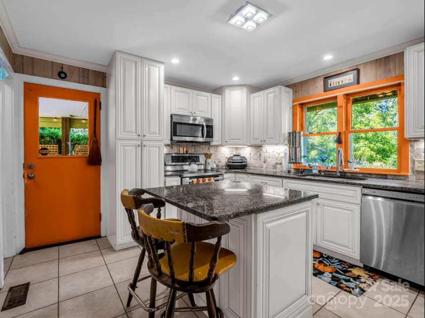 81 Jericho Drive, Tryon, NC 28782.  MLS# CAR4294582, YatesRealty ID 3316. Kitchen on Main