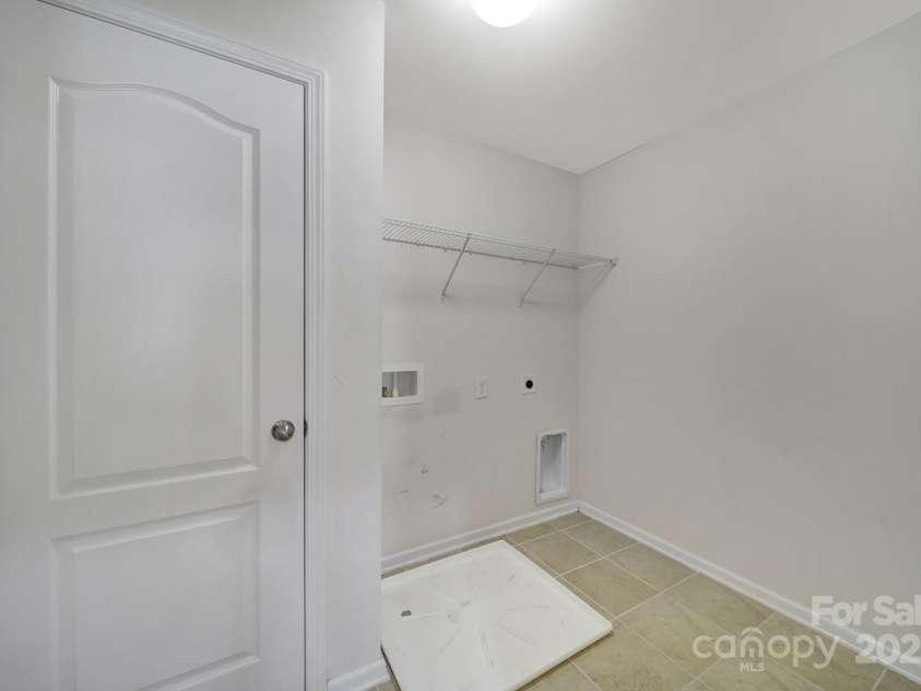 10328 Ebbets Road, Charlotte, NC 28273.  MLS# CAR4278139, YatesRealty ID 33163. Laundry Room