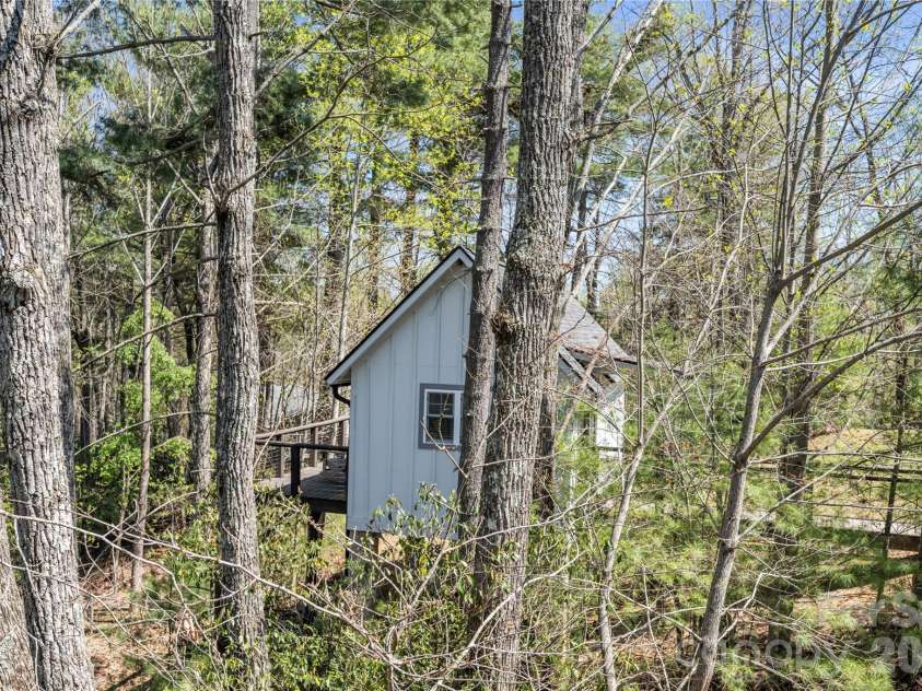 156 Ellerslie Acre None, Hendersonville, NC 28739.  MLS# CAR4366914, YatesRealty ID 33169. Private back deck for guest cottage
