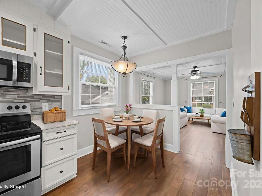 318 5th Street, Albemarle, NC 28001.  MLS# CAR4289630, YatesRealty ID 33171. Virtually Staged - Breakfast Table