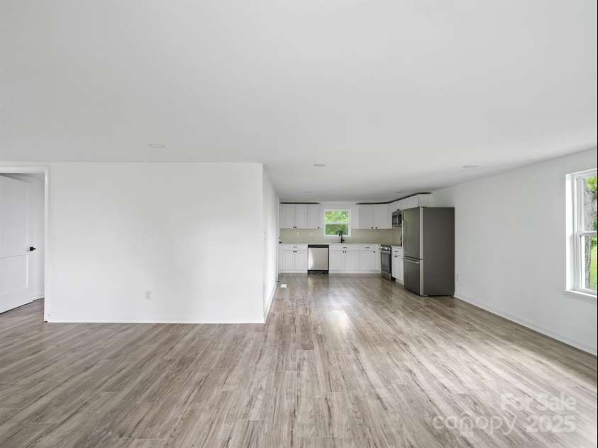 195 Stone Avenue, Concord, NC 28027.  MLS# CAR4291205, YatesRealty ID 33173. From Living Area to Kitchen