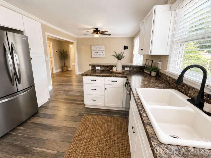 203 Danita Drive, Locust, NC 28097.  MLS# CAR4393303, YatesRealty ID 33174. Virtually staged.