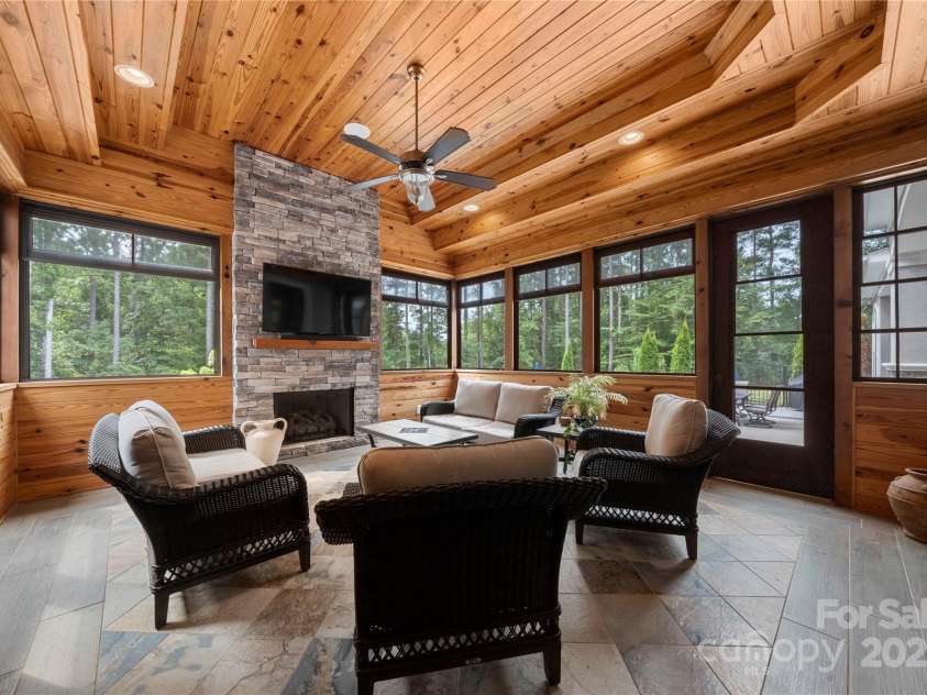 650 Top Ridge Lane, Clover, SC 29710.  MLS# CAR4280257, YatesRealty ID 33174. Enclosed patio with fireplace