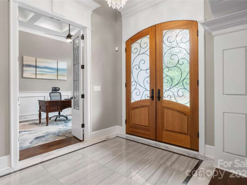 650 Top Ridge Lane, Clover, SC 29710.  MLS# CAR4280257, YatesRealty ID 33174. Gorgeous foyer with ornate double doors and marble flooring