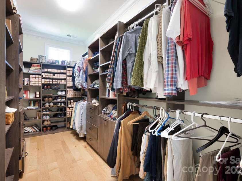 33 Penley Park Drive, Weaverville, NC 28787.  MLS# CAR4286490, YatesRealty ID 33176. A spacious walk-in closet complements the primary suite.