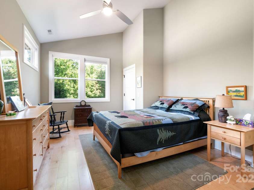 33 Penley Park Drive, Weaverville, NC 28787.  MLS# CAR4286490, YatesRealty ID 33176. The secondary ensuite bedroom offers added privacy, situated across the home from the primary suite.