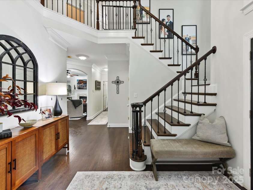 4032 Cambridge Hill Lane, Charlotte, NC 28270.  MLS# CAR4277573, YatesRealty ID 33179. A 2-story entry greets you with lovely hardwood floors throughout most of the home.