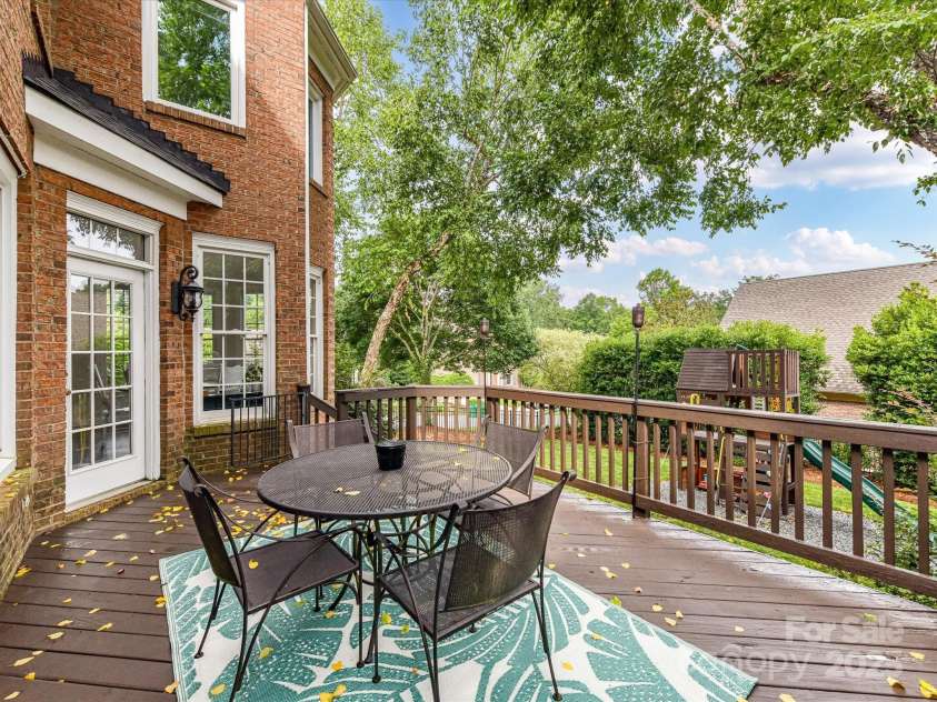 4032 Cambridge Hill Lane, Charlotte, NC 28270.  MLS# CAR4277573, YatesRealty ID 33179. Back deck