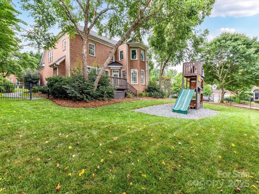 4032 Cambridge Hill Lane, Charlotte, NC 28270.  MLS# CAR4277573, YatesRealty ID 33179. Exterior back view