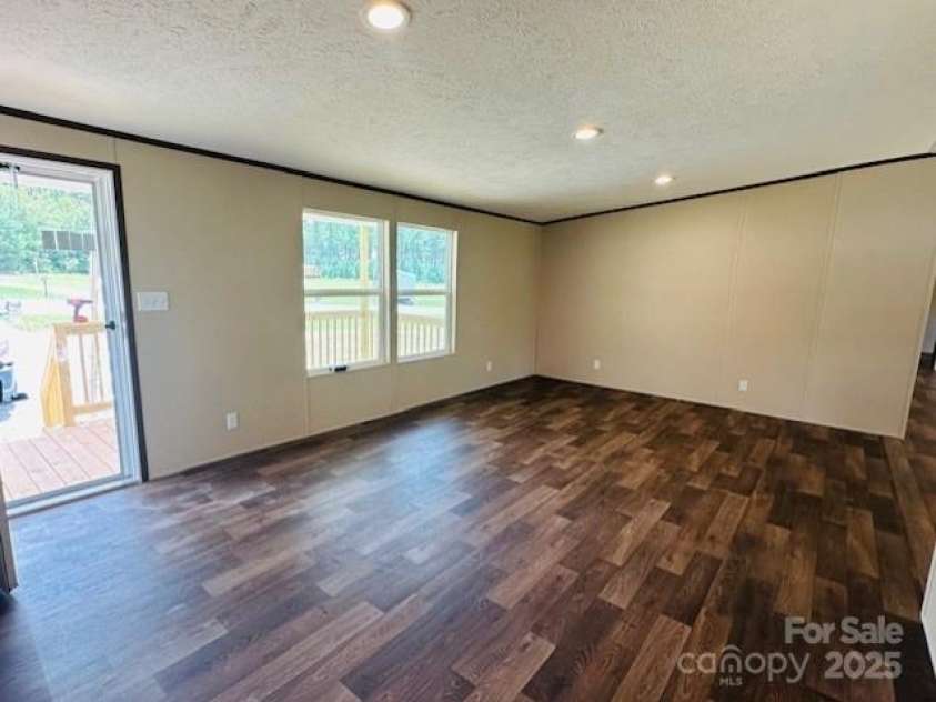 3577 Ken McEntire Road, Lawndale, NC 28090.  MLS# CAR4271509, YatesRealty ID 3318. Living Room 1