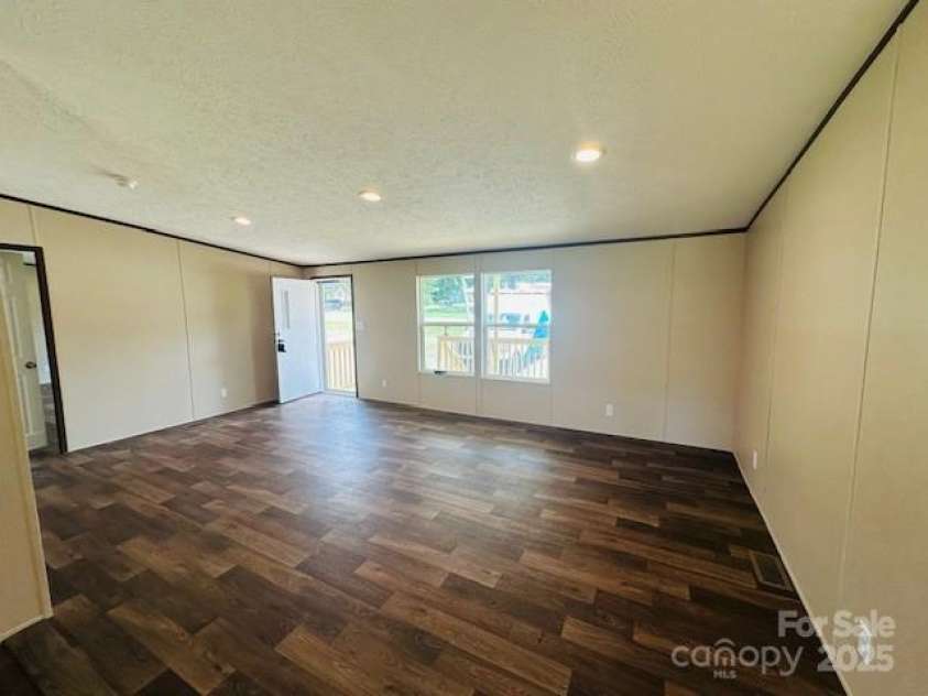 3577 Ken McEntire Road, Lawndale, NC 28090.  MLS# CAR4271509, YatesRealty ID 3318. Living Room 2