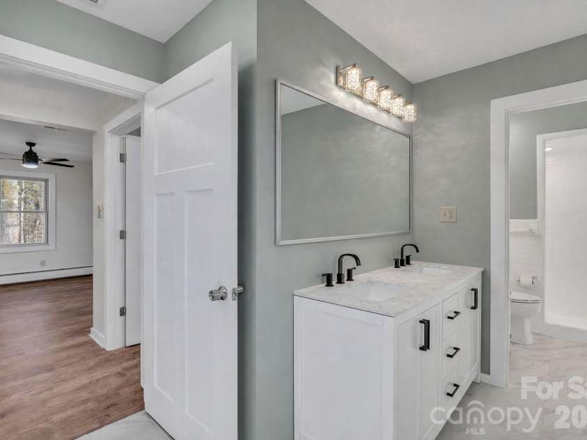 8201 NC 200 Highway, Stanfield, NC 28163.  MLS# CAR4388291, YatesRealty ID 33185. Primary full bath