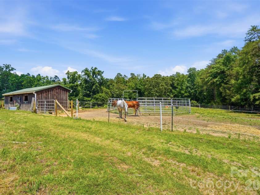 5835 Kreps Road, Clover, SC 29710.  MLS# CAR4397393, YatesRealty ID 33188. Round pen / Rear pasture