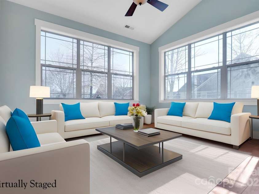 24-#S-4 Brookstone Place, Candler, NC 28715.  MLS# CAR4289931, YatesRealty ID 33190. Airy sunroom perfect for relaxing