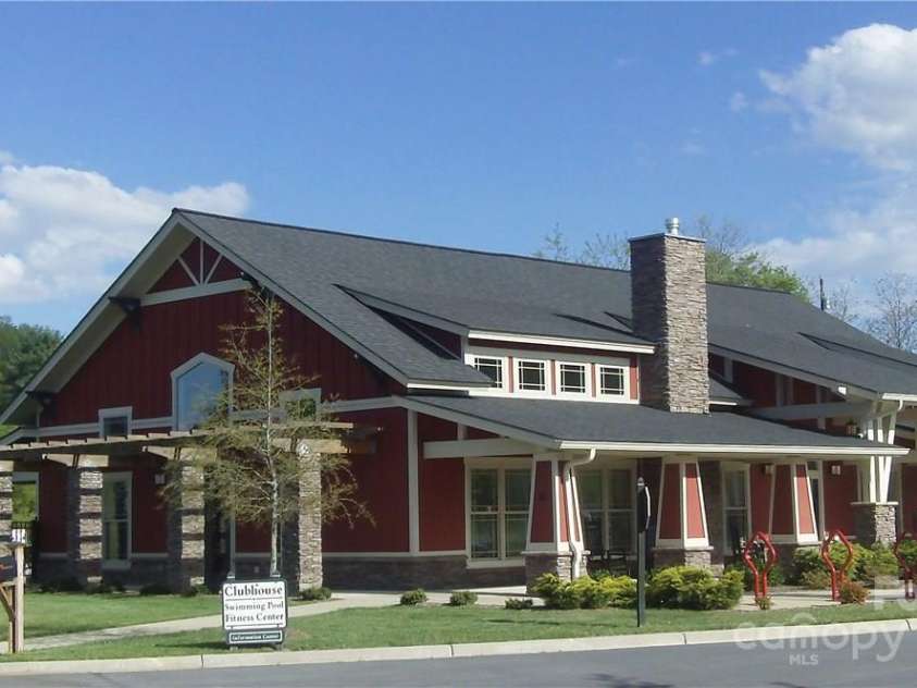 24-#S-4 Brookstone Place, Candler, NC 28715.  MLS# CAR4289931, YatesRealty ID 33190. Beautiful Clubhouse with fitness center, pool table, outdoor kitchen & fireplace with swimming pool