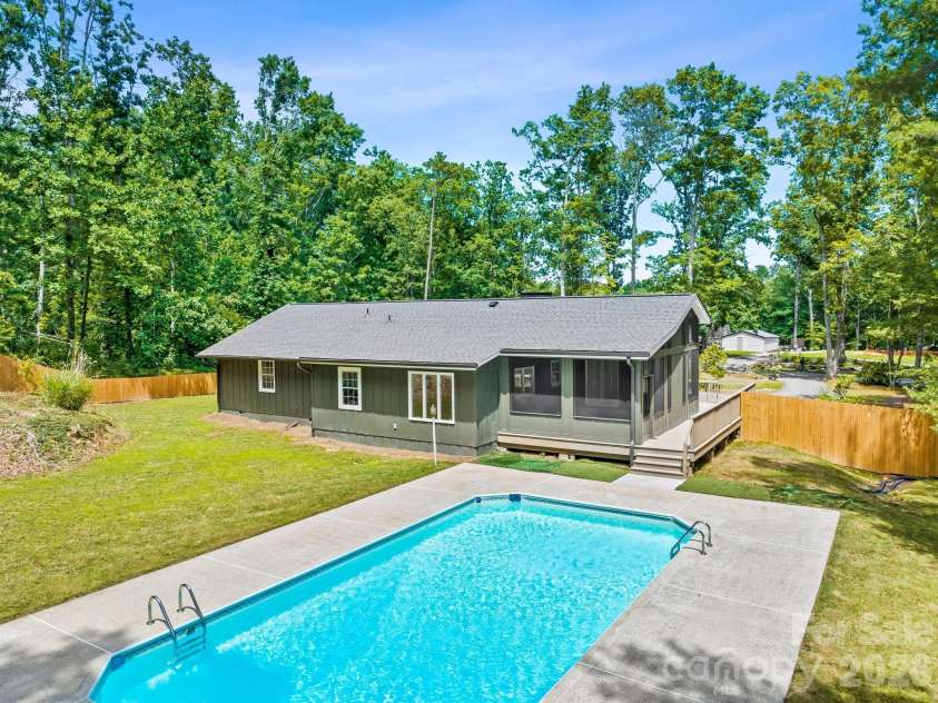 26 Glen Cove Road, Arden, NC 28704.  MLS# CAR4394525, YatesRealty ID 33191. 1700 SF patio pool area