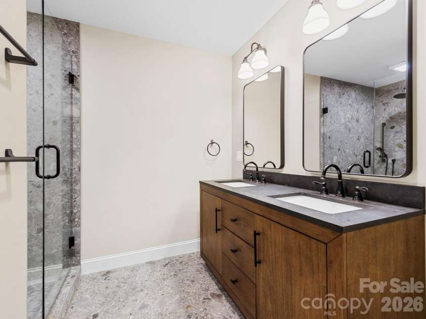 26 Glen Cove Road, Arden, NC 28704.  MLS# CAR4394525, YatesRealty ID 33191. Double vanity in the Primary bath
