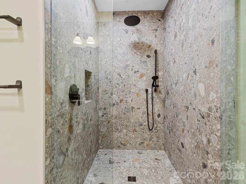 26 Glen Cove Road, Arden, NC 28704.  MLS# CAR4394525, YatesRealty ID 33191. Fully tiled primary shower