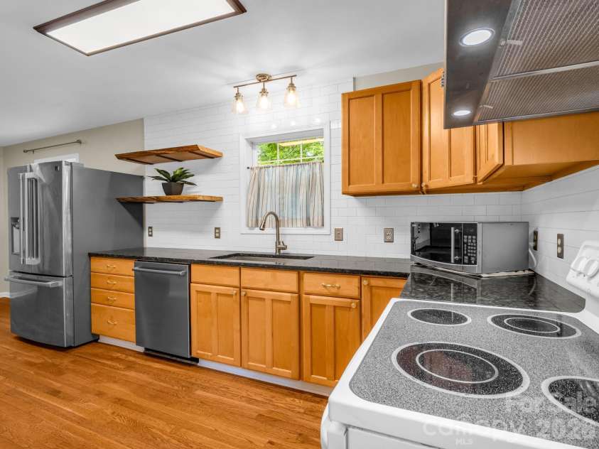 30 Lake Forest Lane, Hendersonville, NC 28739.  MLS# CAR4394922, YatesRealty ID 33193. 