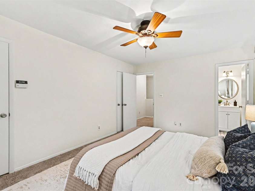 9322 New Towne Drive, Matthews, NC 28105.  MLS# CAR4389735, YatesRealty ID 33195. Primary Bedroom with Dual Closets