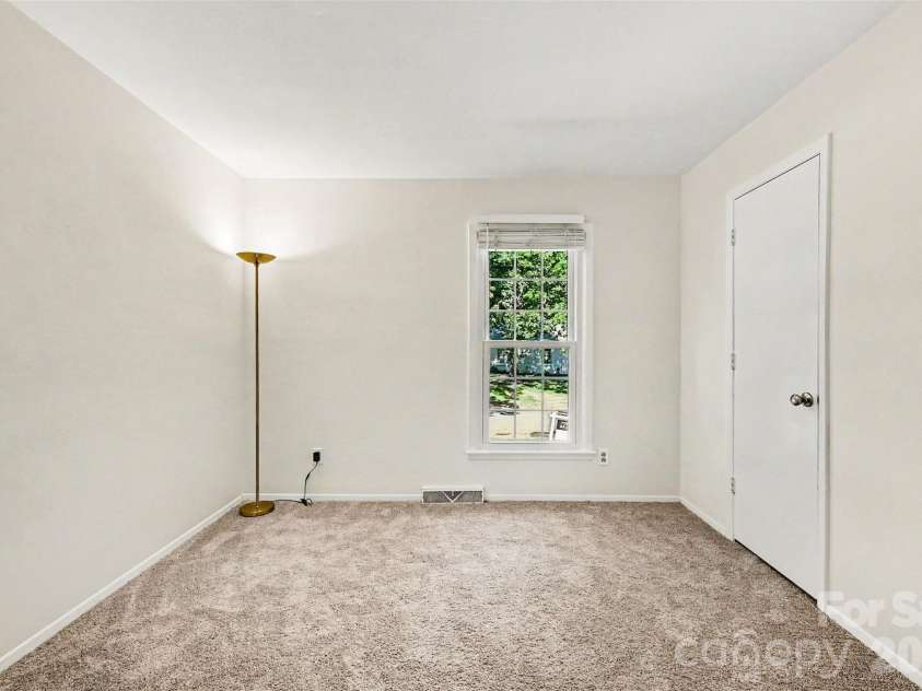 9322 New Towne Drive, Matthews, NC 28105.  MLS# CAR4389735, YatesRealty ID 33195. Secondary Bedroom #2