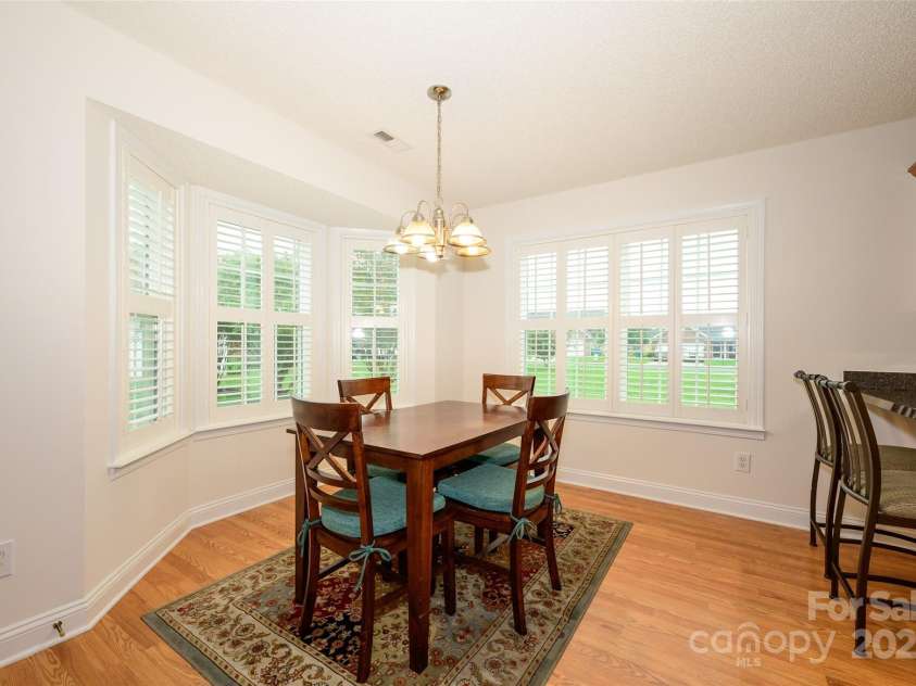 12617 Hill Pine Road, Midland, NC 28107.  MLS# CAR4291136, YatesRealty ID 33201. Having friends over for dinner?  Perfet!  Enjoy this dining room with bay windows with Plantation shutters overlooking the spacious backyard.