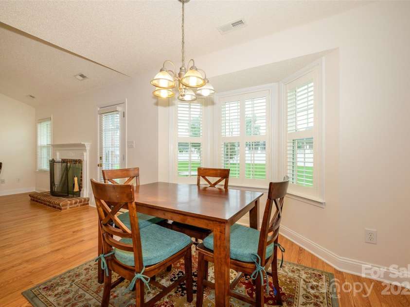 12617 Hill Pine Road, Midland, NC 28107.  MLS# CAR4291136, YatesRealty ID 33201. The back patio is right there to continue with coffee and a sunset.