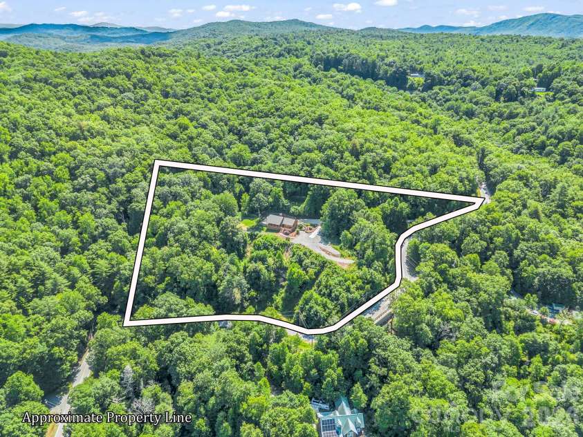 1025 Jeter Mountain Road, Penrose, NC 28766.  MLS# CAR4397105, YatesRealty ID 33202. 2 parcels sold together