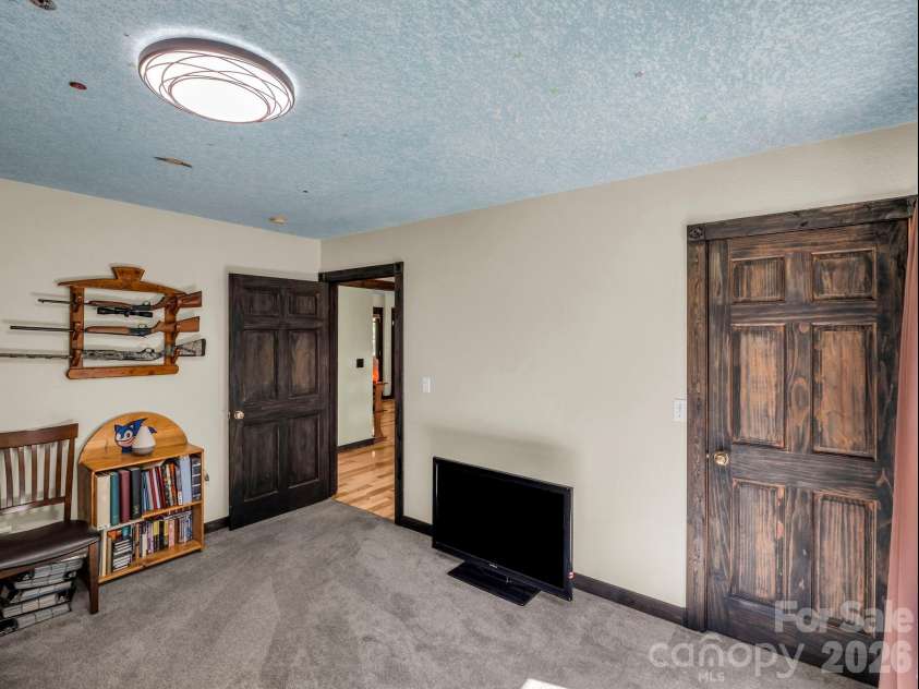 1025 Jeter Mountain Road, Penrose, NC 28766.  MLS# CAR4397105, YatesRealty ID 33202. Bedroom 2 walk in closet