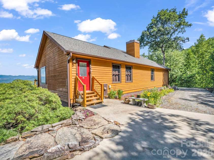 1025 Jeter Mountain Road, Penrose, NC 28766.  MLS# CAR4397105, YatesRealty ID 33202. Boulder steps add function and beauty