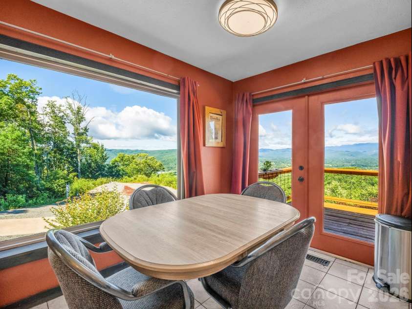 1025 Jeter Mountain Road, Penrose, NC 28766.  MLS# CAR4397105, YatesRealty ID 33202. Dine in kitchen