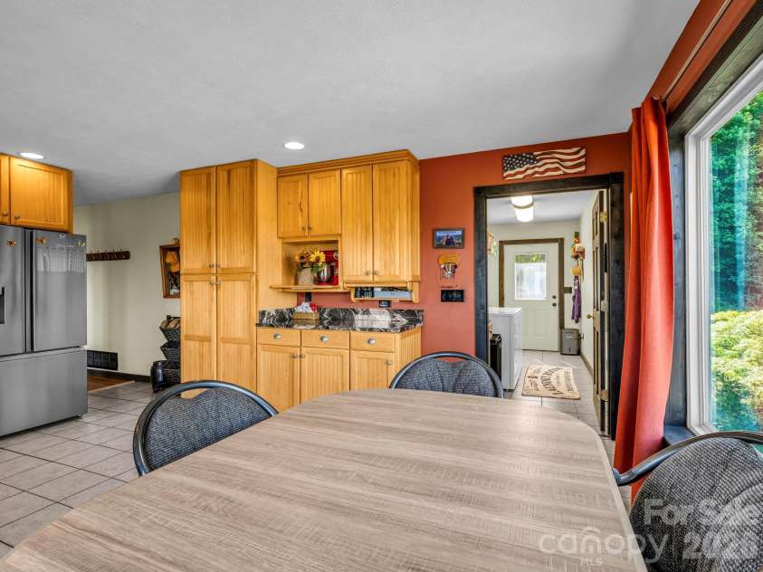 1025 Jeter Mountain Road, Penrose, NC 28766.  MLS# CAR4397105, YatesRealty ID 33202. Door to laundry room