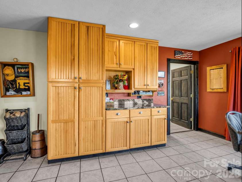 1025 Jeter Mountain Road, Penrose, NC 28766.  MLS# CAR4397105, YatesRealty ID 33202. Pantry