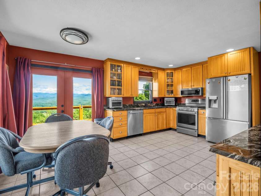 1025 Jeter Mountain Road, Penrose, NC 28766.  MLS# CAR4397105, YatesRealty ID 33202. Spacious kitchen