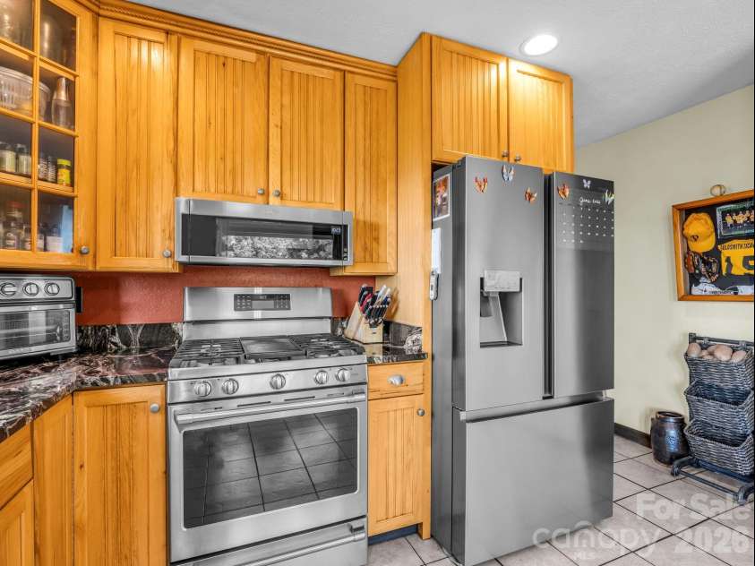 1025 Jeter Mountain Road, Penrose, NC 28766.  MLS# CAR4397105, YatesRealty ID 33202. Stainless appliances