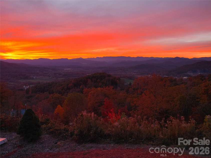 1025 Jeter Mountain Road, Penrose, NC 28766.  MLS# CAR4397105, YatesRealty ID 33202. Stunning Sunsets (no filter needed)