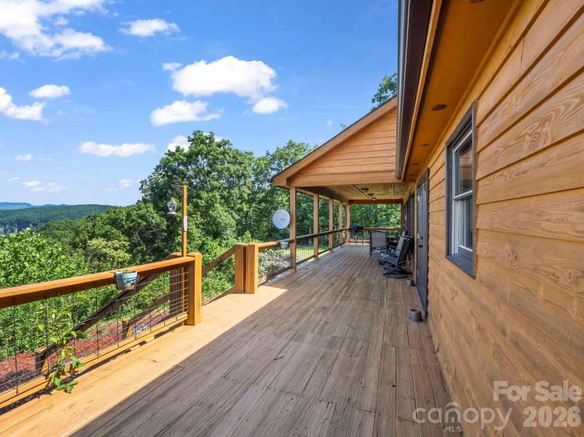 1025 Jeter Mountain Road, Penrose, NC 28766.  MLS# CAR4397105, YatesRealty ID 33202. Sun deck