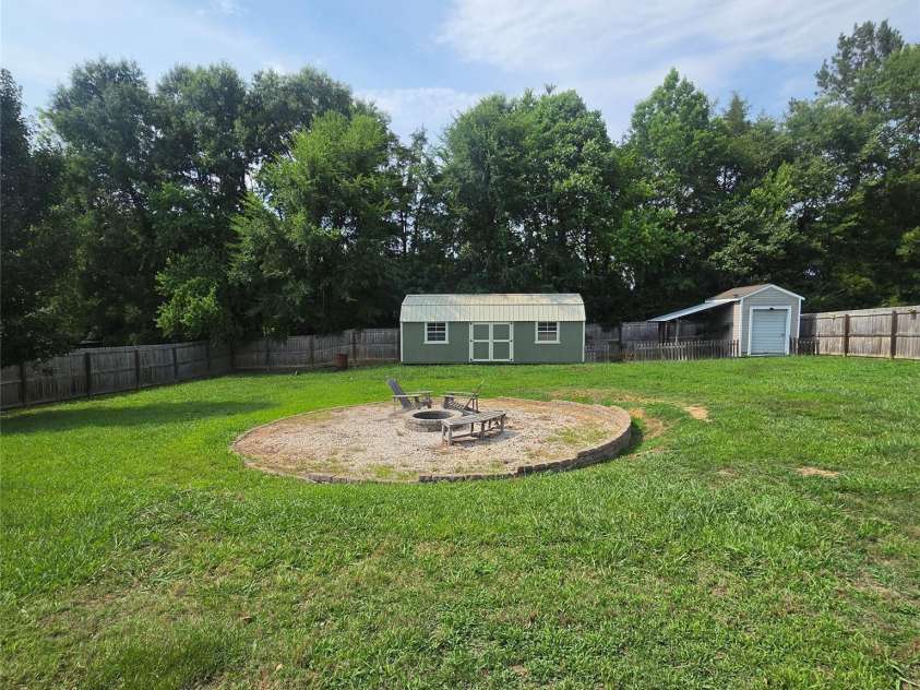 2707 Plantation Way, Albemarle, NC 28001.  MLS# CAR4390049, YatesRealty ID 33203. Back yard