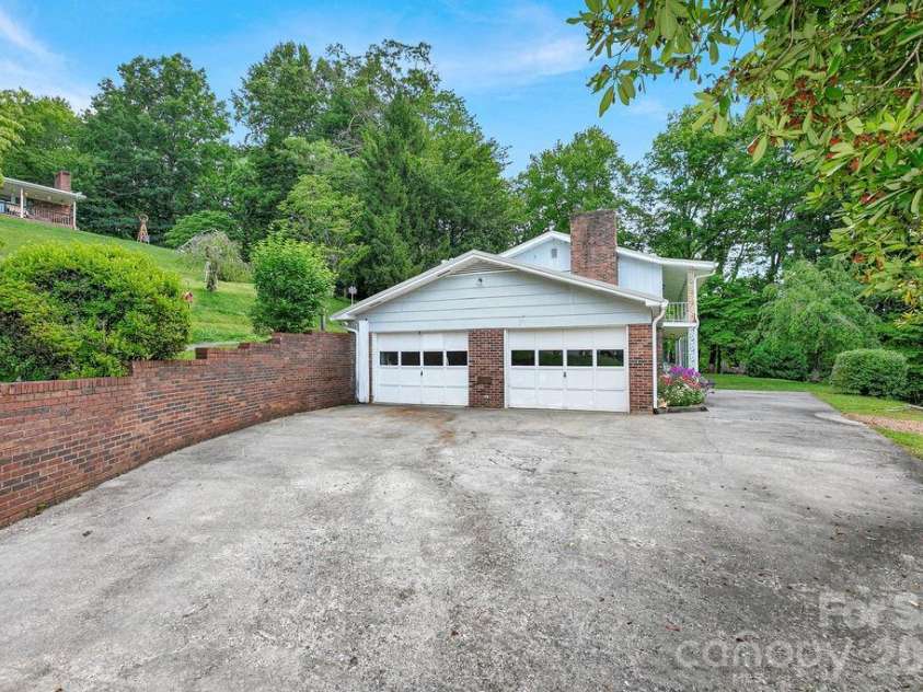 106 Flora Lina Drive, Brevard, NC 28712.  MLS# CAR4397002, YatesRealty ID 33206. 