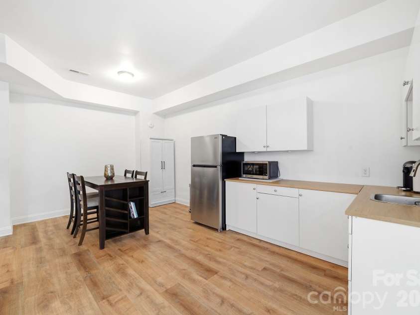 21904 Torrence Chapel Road, Cornelius, NC 28031.  MLS# CAR4380409, YatesRealty ID 33207. Kitchen area in Basement