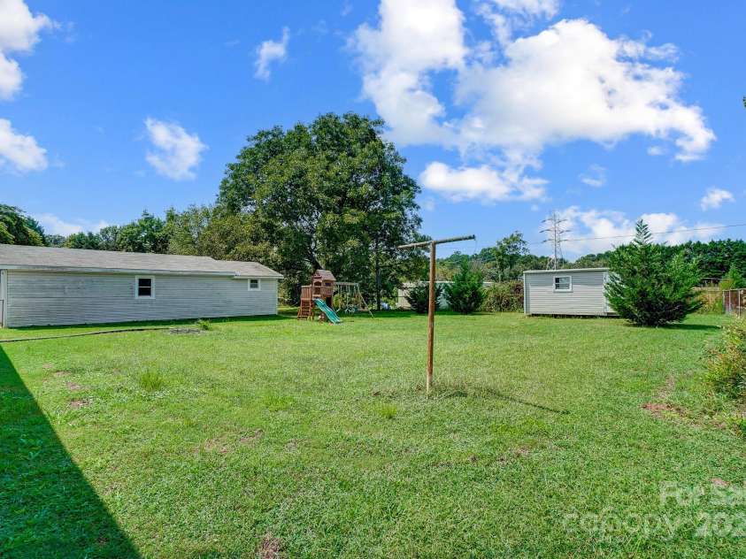 115 Abernathy Street, Mount Holly, NC 28120.  MLS# CAR4181157, YatesRealty ID 3321. Backyard