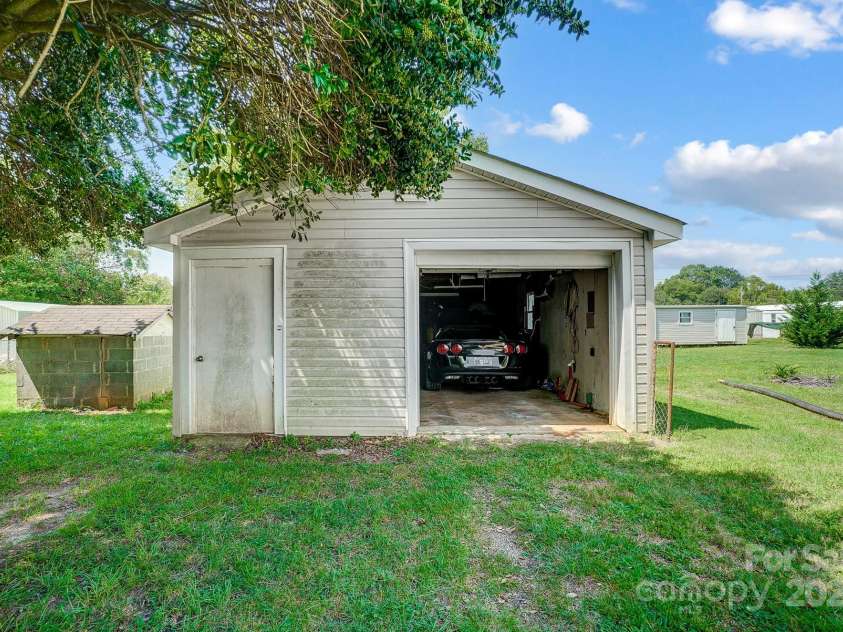 115 Abernathy Street, Mount Holly, NC 28120.  MLS# CAR4181157, YatesRealty ID 3321. Oversized Garage