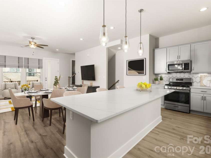 429 Nathaniel Way, Charlotte, NC 28213.  MLS# CAR4183043, YatesRealty ID 3321. Kitchen/Dining/Living *Virtually Staged*