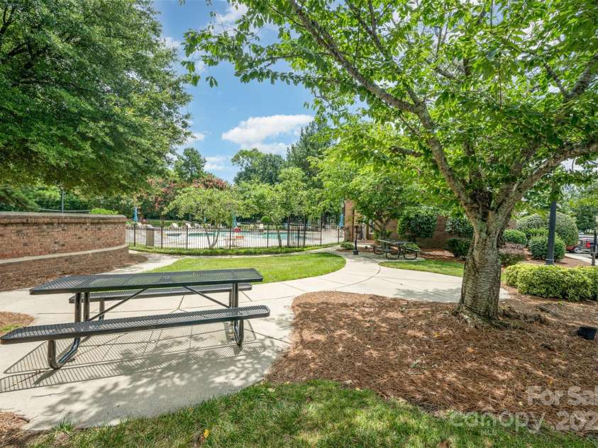 12223 Savannah Garden Drive, Charlotte, NC 28273.  MLS# CAR4274964, YatesRealty ID 33210. Picnic area next to the pool
