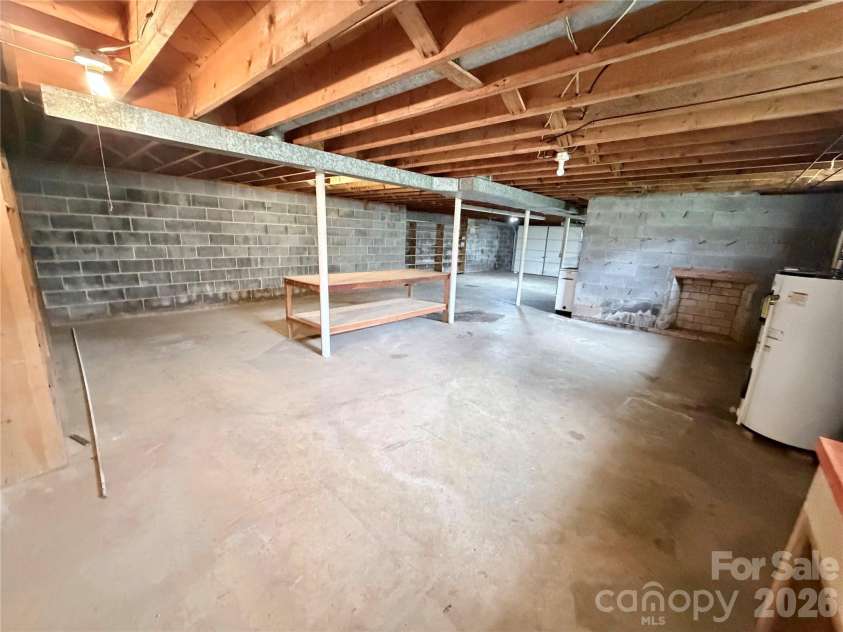 56 Henson Drive, Waynesville, NC 28786.  MLS# CAR4374439, YatesRealty ID 33211. Basement