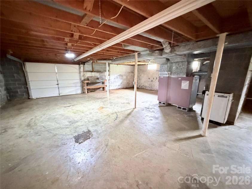 56 Henson Drive, Waynesville, NC 28786.  MLS# CAR4374439, YatesRealty ID 33211. Basement