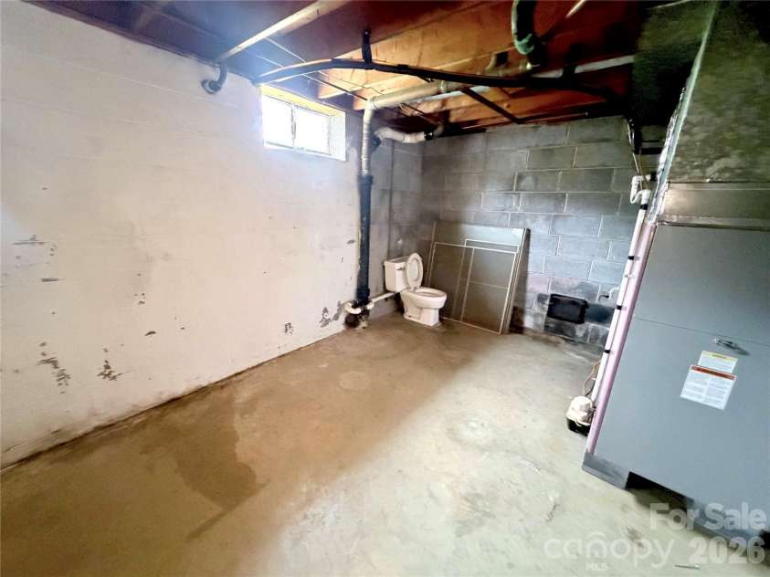 56 Henson Drive, Waynesville, NC 28786.  MLS# CAR4374439, YatesRealty ID 33211. Basement