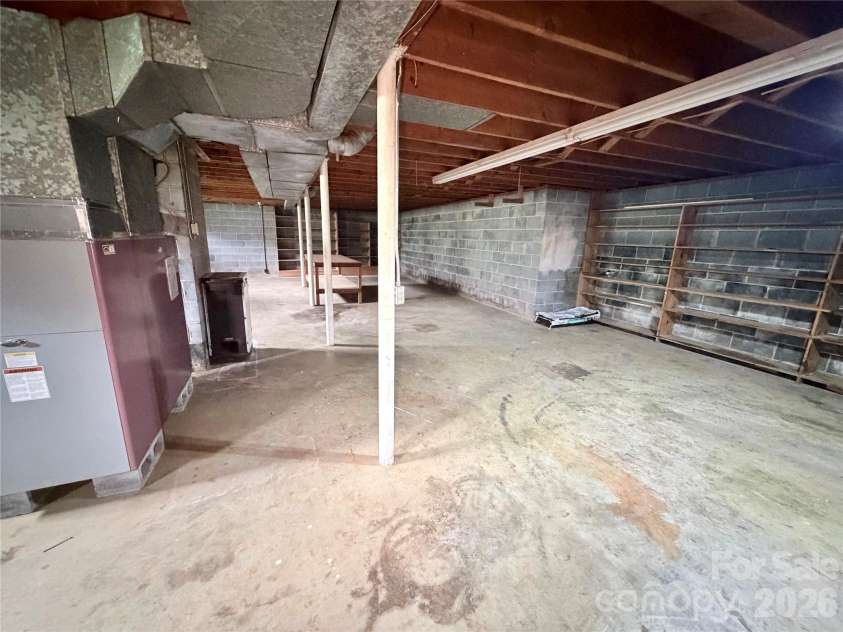 56 Henson Drive, Waynesville, NC 28786.  MLS# CAR4374439, YatesRealty ID 33211. Basement